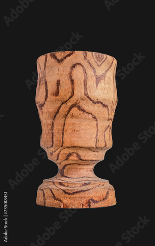 Wooden wine goblet. A glass has a wide, deep bowl and is used to serve water, wine or other beverages. It is usually associated with formal or ceremonial occasions.