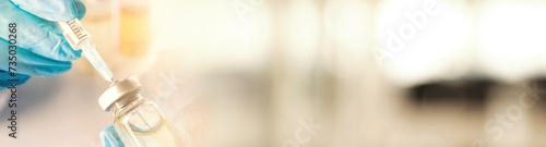 Konstfotografi Doctor filling syringe with medication from glass vial on blurred background, closeup