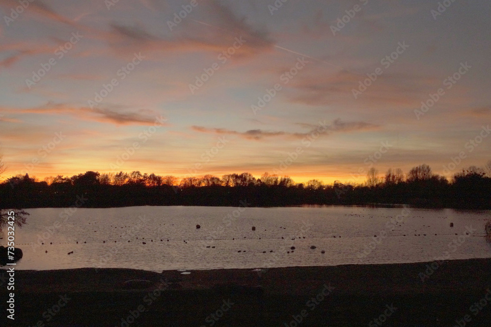 Fototapeta premium sunset over the river