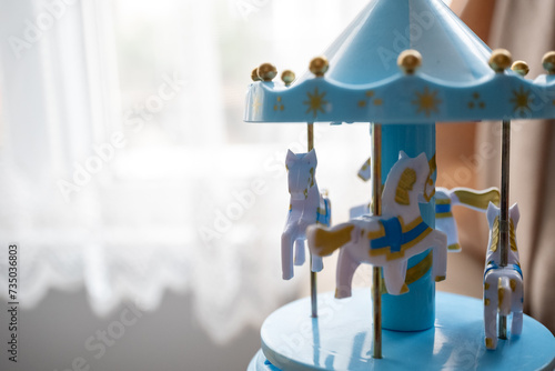 blue tiny carousel toy music box
