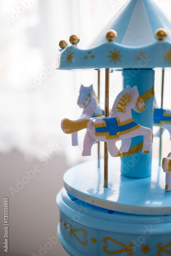 blue tiny carousel toy music box © Sanlad