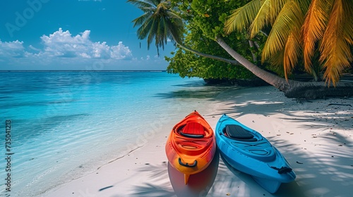 Vibrant red and blue kayaks on a picturesque tropical shore.
