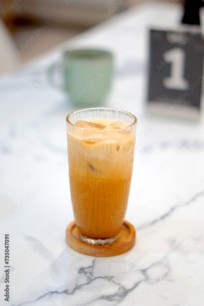 Cold Tarik Tea at a minimalist cafe in Indonesia Cold Tarik Tea at a minimalist cafe in Indonesia