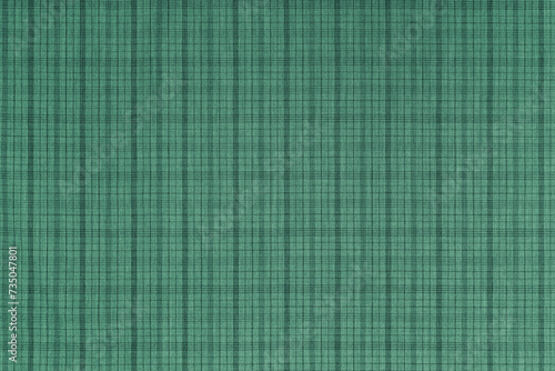 Green checkered texture fabric, tartan pattern. Shirt fabric, tablecloth textile, linen plaid cloth, classic scottish check pattern. Backdrop, wallpaper, background.
