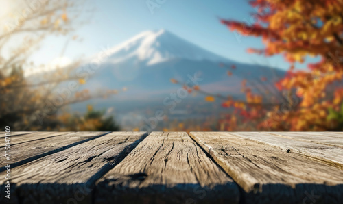 The empty wooden table top with blur background of Mount Fuji. Exuberant image © sutagon