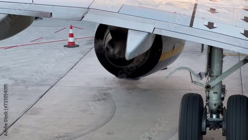 Smoke coming out of a Boeing 737-800 engine parked at the stand