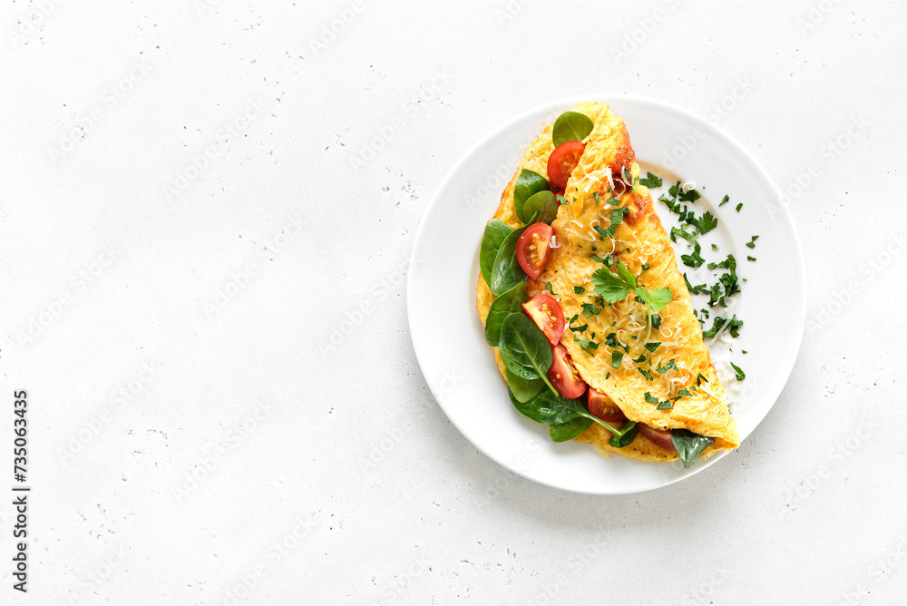 Stuffed omelette with tomatoes and spinach Stuffed omelette with tomatoes and spinach
