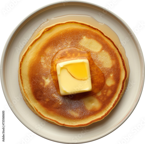 Tasty pancakes with butter and honey on plate isolated.