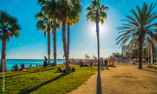 Cuadro en lienzo A view over La Malagueta beach in Malaga, Spain, with many people enjoying the g