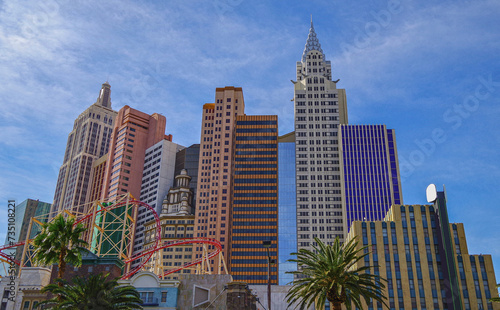 Photography Neon signs, glitz casino hotel resorts, traffic and highrise city skyline in sup