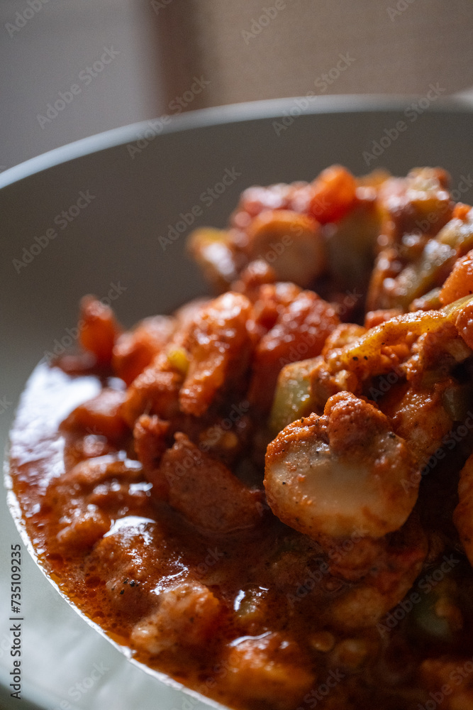 Shrimp with tomatoes on a baking plate, close-up Shrimp with tomatoes on a baking plate, close-up