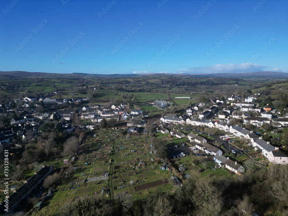 Moretonhampstead, Dartmoor, Devon, England: DRONE VIEWS: The drone shows the medieval town including its church, houses and allotments. The town was mentioned in the Domesday Book of 1086 AD.