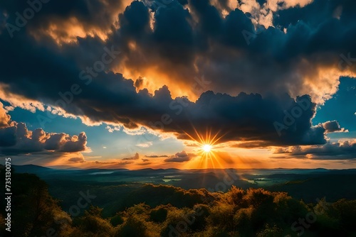 Sunrise dramatic blue sky with orange sun rays breaking through the clouds. Nature background. Hope concept