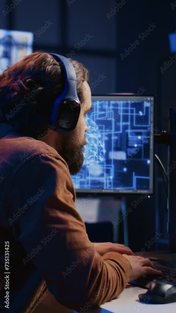 Developer updating artificial intelligence neural networks, drinking coffee and listening music in personal office. IT expert enjoying hot beverage and audio podcasts while writing AI code, camera B Developer updating artificial intelligence neural networks, drinking coffee and listening music in personal office. IT expert enjoying hot beverage and audio podcasts while writing AI code, camera B