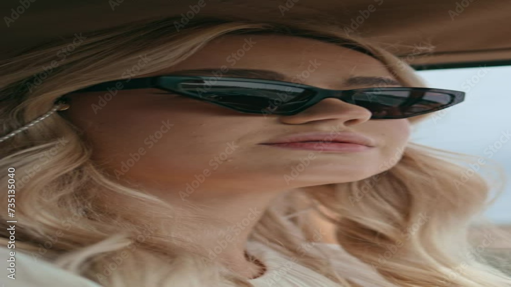 Portrait woman driver travelling with retro car. Girl driving closeup vertical Portrait woman driver travelling with retro car. Girl driving closeup vertical