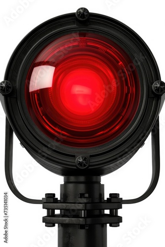 A detailed close-up shot of a red light attached to a pole. This image can be used to represent traffic signals, road safety, or urban infrastructure