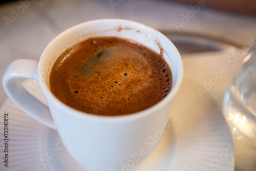 Turkish coffee in white cup