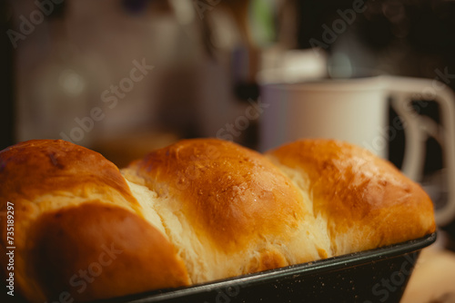 Fresh Baked Bread In Kitchen With Utensils