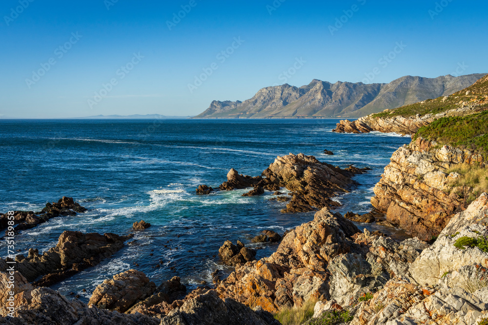 View across False Bay towards Gordons Bay along Clarence Drive between Gordon's Bay and Rooi-Els near Cape Town, Western Cape. South Africa