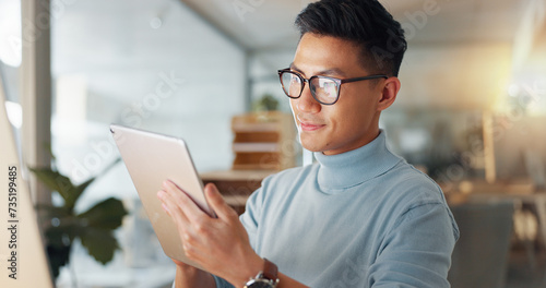 Fotografi Asian man with tablet, glasses and reflection, thinking and reading email, review or article at startup