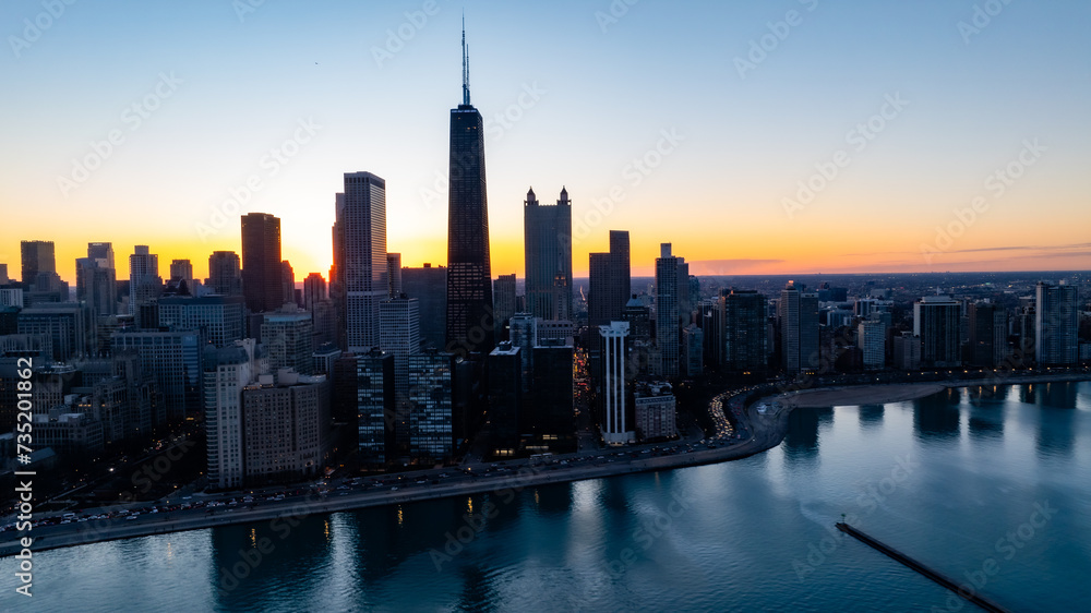 Obraz premium Drone view of Downtown Chicago skyline line over Lake Michigan 