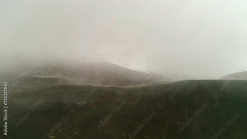 Aerial Backward Scenic View Of Foggy Weather On Tranquil Hills Against Sky - Puerto Montt, Chile Aerial Backward Scenic View Of Foggy Weather On Tranquil Hills Against Sky - Puerto Montt, Chile