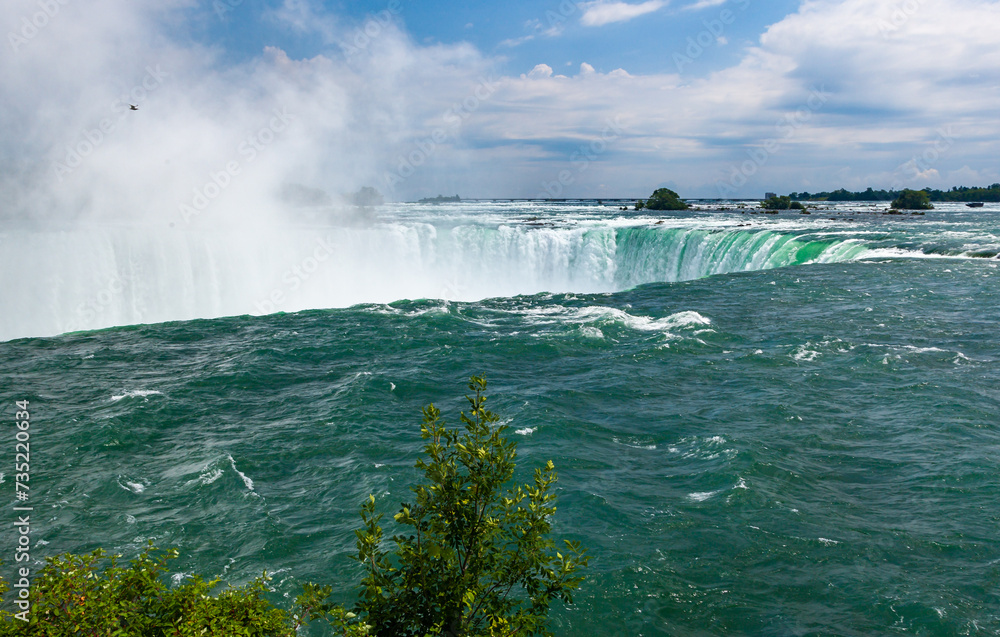 Clouds of splashes and falling water from Niagara Falls, Niagara State Park, USA Clouds of splashes and falling water from Niagara Falls, Niagara State Park, USA