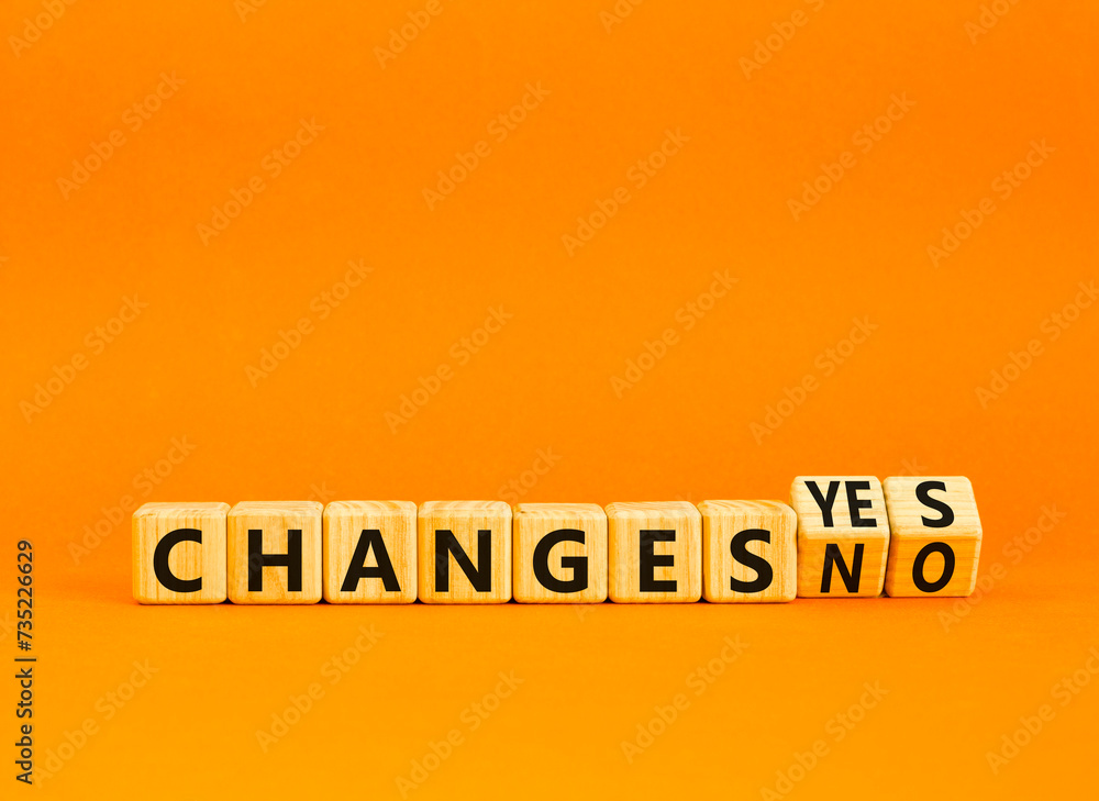 Changes yes or no symbol. Concept words Changes no to Changes yes on beautiful wooden cubes. Beautiful orange table orange background, copy space. Business and changes yes or no concept. Changes yes or no symbol. Concept words Changes no to Changes yes on beautiful wooden cubes. Beautiful orange table orange background, copy space. Business and changes yes or no concept.