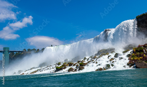 Fototapeta Naklejka Na Ścianę i Meble -  Clouds of splashes and falling water from Niagara Falls, Niagara State Park
