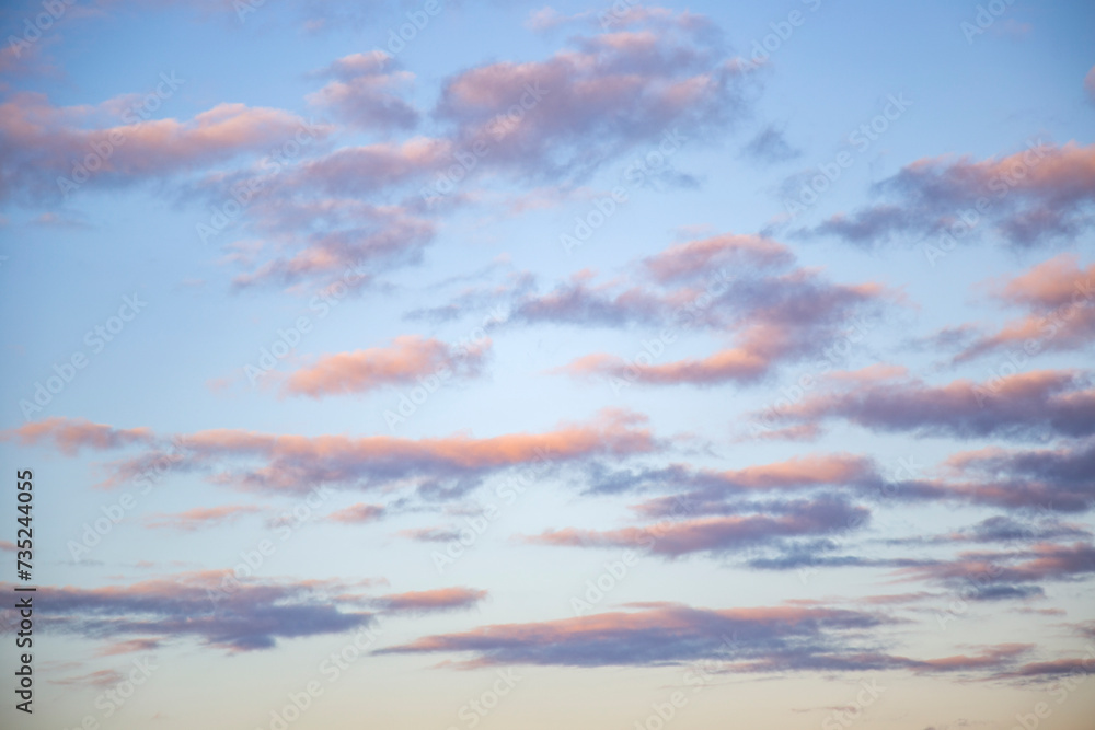 beautiful cloudscape, colorful pink and blue  clouds at sunset abstract background with copy space