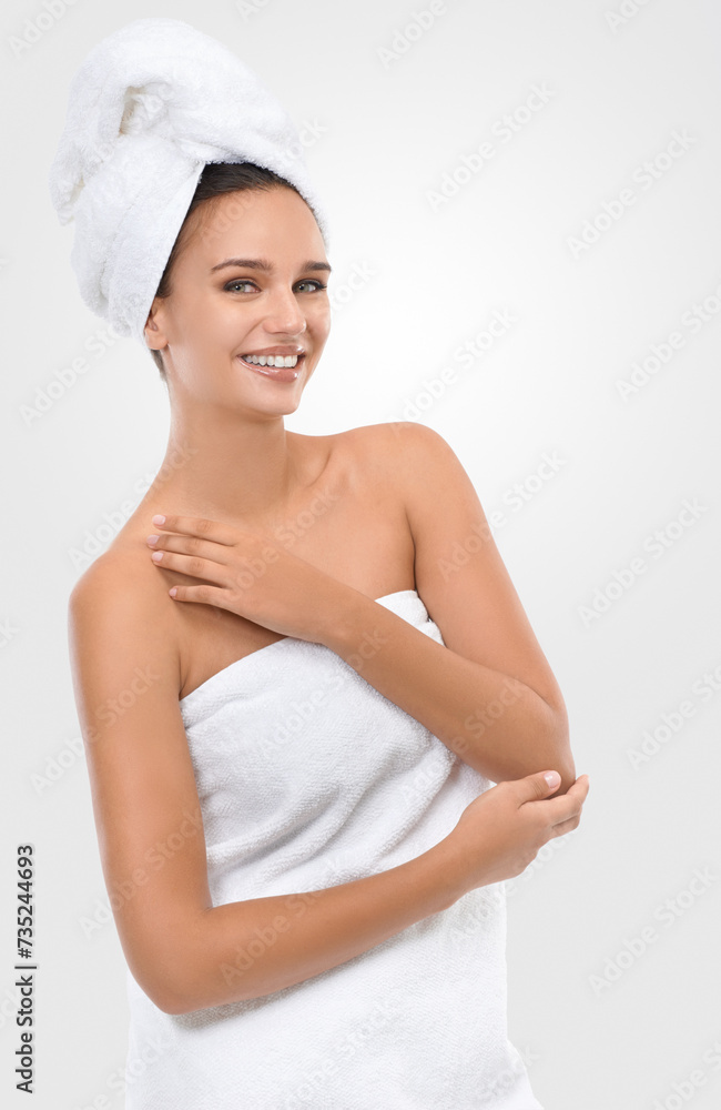 Woman, skincare and cosmetology in studio portrait, confidence and proud of shine on white background. Happy female person, towel and smile for facial treatment, glow and dermatology for grooming Woman, skincare and cosmetology in studio portrait, confidence and proud of shine on white background. Happy female person, towel and smile for facial treatment, glow and dermatology for grooming