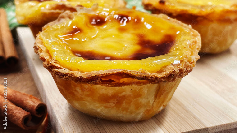 Lots of desserts Pastel de nata or Portuguese egg tart and cinnamon ...