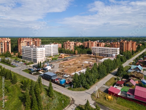 Photography the construction site of an apartment building in the summer from a height