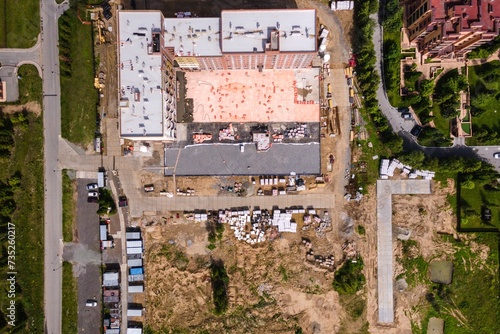 Photography the construction site of an apartment building in the summer from a height