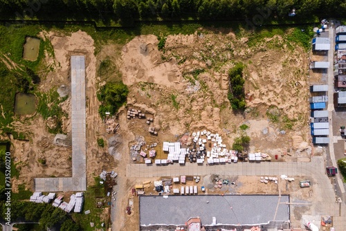 Wall Mural the construction site of an apartment building in the summer from a height