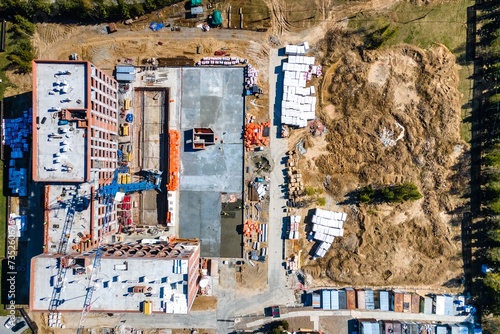 Photography the construction site of an apartment building in the summer from a height