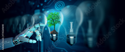 Robot hand pointing Tree in the Light bulb against nature with digital convergence and technology background. Ecology, Energy, Environment, Green Technology, and IT ethics Concept.