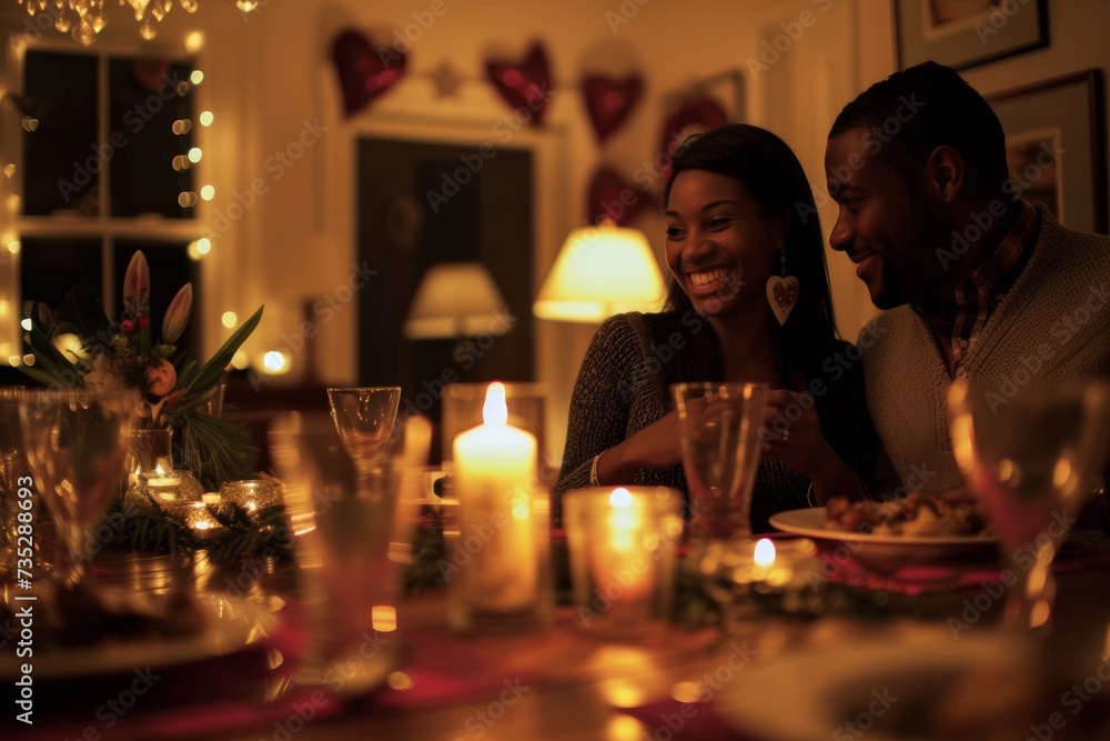 Amidst the warm glow of candles and festive christmas decorations, a man and woman share an intimate dinner, their faces illuminated by the soft light as they clink their wine glasses in celebration Amidst the warm glow of candles and festive christmas decorations, a man and woman share an intimate dinner, their faces illuminated by the soft light as they clink their wine glasses in celebration