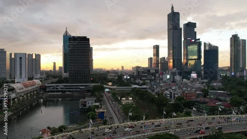 Aerial hyperlapse, dronelapse video of Jakarta city at sunset. Jakarta, Indonesia photo