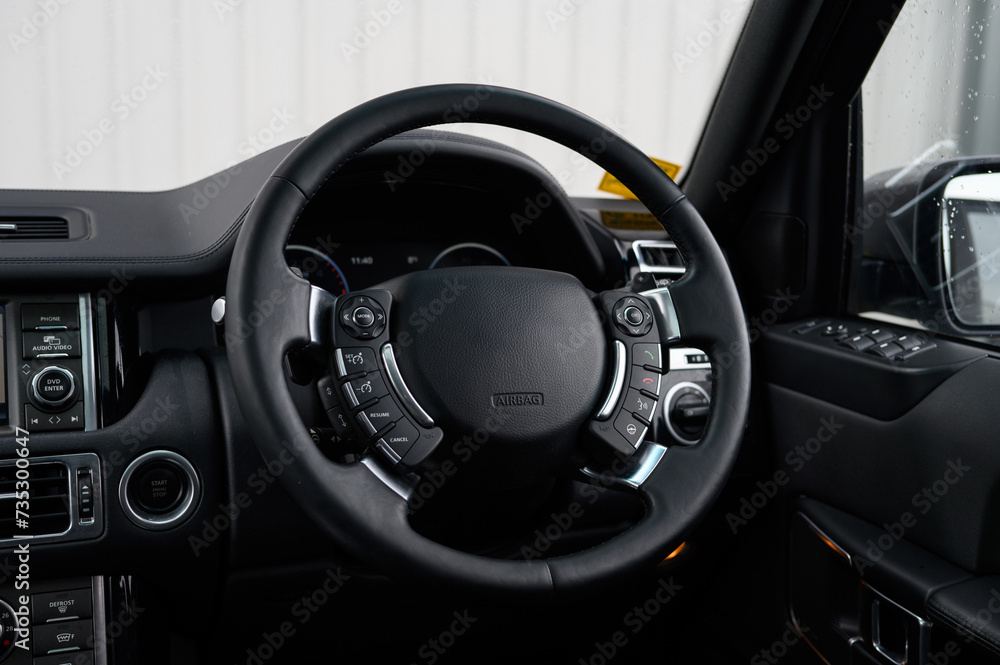 Luxury car steering wheel with controls