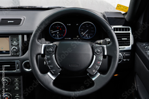 Luxury car interior steering wheel © Harry