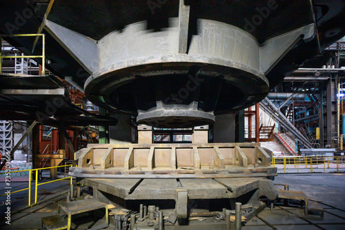 Preparation of the reactor vessel bottom at factory machine.