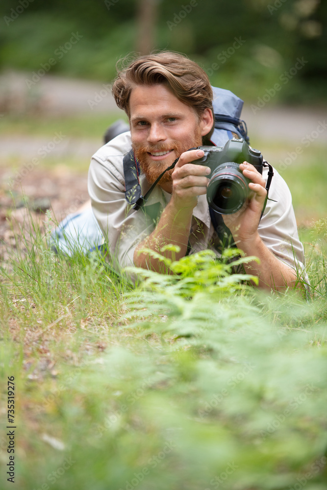 tourist man hold in hands camera tourist man hold in hands camera