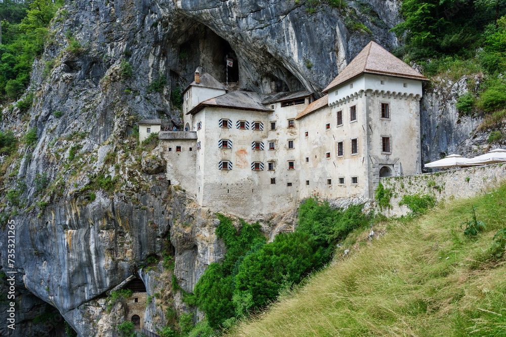 Predjama, Slovenia - June 27, 2023: Predjama Castle in Slovenia, Europe. Renaissance castle built within a cave mouth in south central Slovenia.