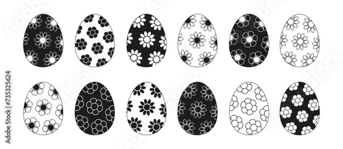 Set of Easter eggs with floral patterns. Black and white vector illustration.