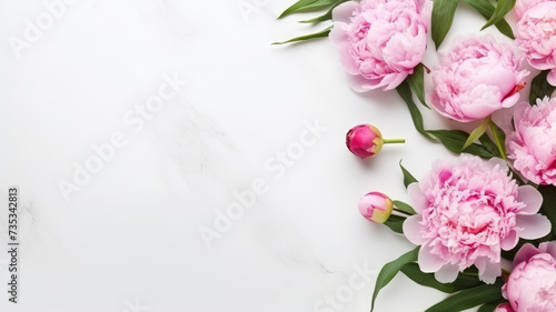 composition of a bouquet of pink peony flowers, top view with copy space on a white background