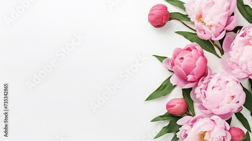 composition of a bouquet of pink peony flowers, top view with copy space on a white background