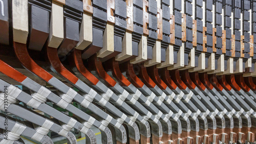 Assembling stator winding in factory workshop.