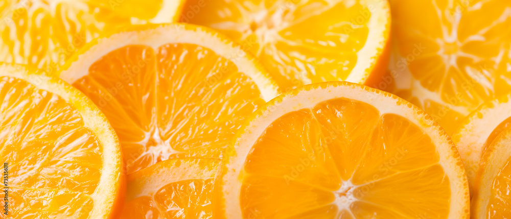 Fatias de fruta laranja fresca close-up como plano de fundo - obrazy, fototapety, plakaty 