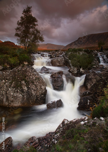 Glencoe valley and waterfall, highland, scotland